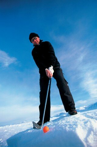 Jogador de golfe na neve